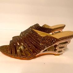 Nwot- Gorgeous Gold Evening Slide Sandals With Silver Rhinestone Embellishments. Leather Sole. Heel Measures Approximately 3.25 Inches. Soft, Leather-Like Lining. Never Worn, Perfect Condition. Rhinestone Embellishments, Silver Rhinestone, Slide Sandals, Shoes Women Heels, Soft Leather, Silver Gold, Embellishments, Shoes Heels, Women Shoes