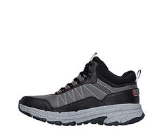 Skechers GO RUN Trail Altitude Men's Hiking Boot Lightweight comfort in the Skechers GO RUN Trail Altitude - Ridgetop men's hiking Boot is still ready to run. With a mesh & leather upper , this mid-top hiker is rugged and durable. The Skechers Air-Cooled Goga Mat™ insole and ULTRA LIGHT midsole offer responsive, high-rebound cushioning while the flexible sole is trail ready with multi-directional traction. Mesh/leather upper Lace-up closure Air Cooled Goga Mat insole ULTRA LIGHT Black Sneakers With Cushioned Footbed For Outdoor Work, Black Cushioned Sneakers For Outdoor Work, Gray Sporty Boots For Sports, Rugged Waterproof Sports Boots With Cushioned Footbed, Rugged Sports Boots With Cushioned Footbed, Rugged Sports Walking Shoes, Black Cushioned Hiking Boots For Sports, Rugged Weatherproof Sneakers For Sports, Rugged Weatherproof Sports Sneakers