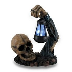 a skeleton holding a lantern in its hand