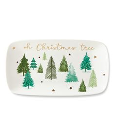 a christmas tree platter with green trees on it