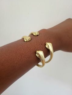 Handmade and high quality fist brass bangles. Designed and created by Moon Goddess using a West African jewelry making technique. Available as a single or a set of TWO Adjustable cuffs to fit desired size. 100% Raw Brass.   W E' R E    S O C I A L  * IG: @MoonGoddessVibez * TIKTOK: https://www.tiktok.com/@shopmoongoddess *  PINTEREST: https://www.pinterest.com/MoonGoddessShop/ Many THANKS for visiting us ✨️ Bracelets Boho, Brass Bangle, Stackable Bracelets, African Jewelry, Moon Goddess, Raw Brass, Unisex Style, Unisex Fashion, Bangle Bracelets