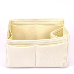 the inside of a white purse with two compartments