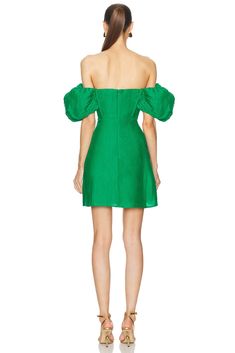 Find CULT GAIA Lissett Dress In Green on Editorialist. Cult Gaia Lissett Dress in Green Self: 38% linen 25% wool 20% rayon 17% silk Lining: 95% polyester 5% spandex. Made in China. Dry clean only. Fully lined. Hidden back zipper closure. Front U-wire detail. Off the shoulder styling. Midweight linen fabric. GAIA-WD226. DR3246FL1565. About the designer: Cult Gaia first found popularity with its architecturally memorable Ark bag, carried by the influential fashion elite. Created in 2012, founder a Silk Puff Sleeve Dress For Cocktail, Green Puff Sleeve Evening Dress For Spring, Chic Fitted Green Puff Sleeve Dress, Green Puff Sleeve Dress For Spring Evening, Chic Green Fitted Dress With Puff Sleeves, Chic Green Fitted Puff Sleeve Dress, Elegant Green Mini Puff Sleeve Dress, Fitted Green Puff Sleeve Dress For Party, Green Fitted Puff Sleeve Dress For Party