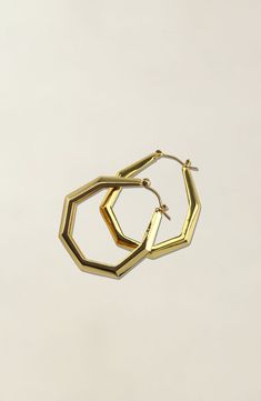 Geometric shaped small Octagon hoop earrings in gold Due to hygiene-related reasons, this item may not be returned. Weight 15 g Geometric Metal Earrings For Everyday, Modern Gold-tone Metal Hoop Earrings, Gold Octagon Hoop Earrings As Gift, Modern Gold Octagon Earrings, Elegant Geometric Metal Hoop Earrings, Modern Gold Hexagon Earrings, Modern Gold-tone Brass Hoop Earrings, Modern Geometric Metal Hoop Earrings, Gold Geometric Earrings For Everyday