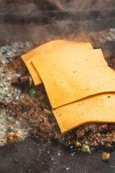 some kind of food that is cooking in a pan