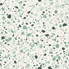 an abstract green and beige pattern with small dots on it's surface, which is very