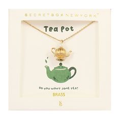 a necklace with a tea pot on it in a white box and the words,'do you want some tea? '