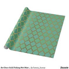 a green and gold pattern wrapping paper