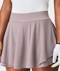 Women's Cleo Clay Tour Skirt - Macade Golf Sports Mini Skirt With Built-in Shorts, Sporty Flowy Tennis Skirt With Built-in Shorts, Flowy Tiered Skirt With Built-in Shorts, Flowy Skirted Swim Skirt With Built-in Shorts, Stretch Golf Skort With Built-in Shorts, Flowy Swim Skirt With Built-in Shorts, Summer Sports Mini Skort, Spring Sports Skort, Stretch Flared Mini Skirt With Built-in Shorts