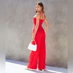 Gorgeous Flattering Halter Jumpsuit In A Perfect Red For The Holiday Season! Black Sleeveless Jumpsuit, Spaghetti Strap Rompers, Velvet Romper, Romper Suit, Halter Jumpsuit, Lace Jumpsuit, Blue Jumpsuits, Red Jumpsuit, Sleeveless Jumpsuits