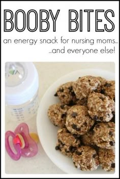 a plate full of granola energy bites next to a baby bottle