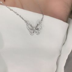 Chic and Versatile: Elevate your style with our Butterfly Necklace, a chic and unique accessory. Stainless Steel: Made from durable stainless steel with an electroplated finish. Butterfly Design: Features a butterfly knot design for added elegance. High-Quality Craftsmanship: Crafted with care and attention to detail for a quality finish. Ideal Gift: A perfect gift for women, reflecting their individuality and style. Korean Style: Inspired by Korean fashion, adding a touch of sweetness and freshness to your look. Animal Element: Incorporates the popular butterfly element, adding a trendy and fashionable twist. Chain Length: 50cm(19.69in) Ships from California, USA Rosen Box, Choker Pendant, Heart Choker, Daily Jewelry, Neck Chain, Butterfly Charm, Butterfly Pendant, Butterfly Necklace, Girls Jewelry