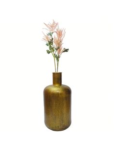 a vase with some flowers in it on a white background