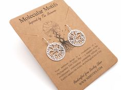 These solid sterling silver earrings are my artistic representation of a Phylogenetic Tree Hillis plot -- a visual snapshot of the evolutionary relationships connecting millions of Earth's various life forms or in simple terms, a biological tree of life. These make a fun and unique fashion statement and are sure to be the topic of conversation! ✦ DETAILS ✦ * Hand-cast from Sterling Silver * Roughly 25mm diameter * Comes with Sterling Silver ear wires or 14k Gold Filled. * Finish color correspond Phylogenetic Tree, Science Themes, Art Carte, Life Form, Earring Tree, Themed Jewelry, Cotton Ball, Hand Cast, Charm Earrings