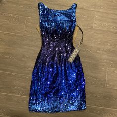 Gorgeous Jovani Blue Ombr Dress With Cutout Sides Covered With Nude Mesh. Low V-Back. New With Tags, Never Worn. Dress Laying Flat Measures 17” Across At Bust, 33” From Top Of Arm To Hem, 11” Across At Waist And 16” Across At Hips. Smoke Free Home. Blue Sequin Knee-length Dress, Blue Knee-length Sequin Dress, Blue Knee-length Mini Dress With Sequins, Royal Blue Sequin Dress For Spring, Formal Blue Sequined Mini Dress, Blue Formal Mini Dress With Sequins, Formal Blue Mini Dress With Sequins, Blue Ombre Dress, Hat Jewelry