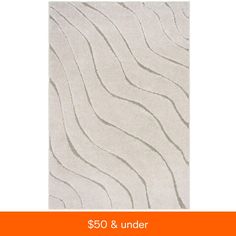 a white rug with wavy lines on it and the words $ 50 & under below