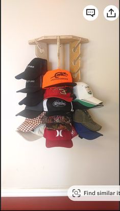 a rack with hats hanging from it's sides