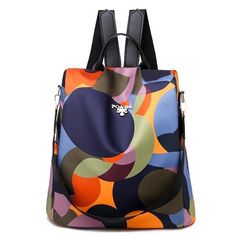 This Waterproof Qxford Shoulder Bag is a nice lightweight Anti-theft backpack. Can be used as a Small Travel Bag as well. Available in a wide range of pretty colors, the Colorful Geometric Backpack Purse is a Best Seller! The high density Oxford fabric and Polyester lining, is soft and has a shiny texture, scratch-resistant, and easy to take care for. The backpack comes with a detachable strap, that allows you the flexibility to wear it as a Shoulder bag/Tote bag/Purse/Shopping bags. Suitable fo Backpack Design, Women Backpack Fashion, Backpack Outfit, Women's Circle, Large Capacity Backpack, Anti Theft Backpack, Cute Backpacks, Fashion Weeks, Large Backpack