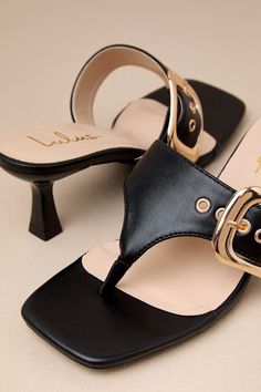 The Lulus Meline Black Buckle Thong Slide Sandals are the fastest way to way to make any 'fit even more chic! Smooth faux leather shapes these must-have sandals that feature a trendy square footbed, a classic thong upper, and a wide vamp strap with an adjustable gold buckle detail at the side. An eye-catching sculpted heel completes the sleek slide-on design! 2. 5" sculpted heel. Lightly cushioned insole. Rubber sole has nonskid markings. Man made materials. Imported. Lulus | Meline Black Buckle Slide Sandals, High Heel, Rubber Sole, High Heels, Faux Leather, Sleek, Buckle, Sandals, Square