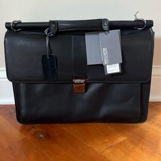 Color: Black Material: Leather Condition: Nwt Top Handle Or Strap, Lock And Key, Fits A Lap Top, Multiple Compartments Lap Top, Lock And Key, Kenneth Cole Reaction, Kenneth Cole, Top Handle, Laptop, Man Shop, Key, Leather