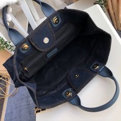 Description CC Deauville Tote Canvas Bag Dark Blue For Women 14.9in/38cm Rep 1:1 Measurements: 38 x 30 x 18 cm / 14.9 x 11.8 x 7 inches ( Length x Width x Height ) Chain Dark Blue Zipper inside Medal hardware Include dust bag. This product is of the best quality. Dior Shirt, Gucci Shirt, Louis Vuitton Shirt, Chanel Shirt, Bag Dark, Luxury Products, Evening Clutch Bag, Balenciaga City Bag, Tote Backpack