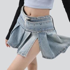 Introducing our ultra mini pleated denim skirt from the 2023 Summer Collection ââ‚?a timeless nod to the '90s. with a modern twist!Why It's Your Next Summer StapleThis 90s-inspired skirt reflects a perfect balance of modern fashion and nostalgia. With its lower-waisted silhouette. light wash. and subtle pleats. you'll add a touch of edginess to any ensemble. Plus. it's made with premium quality denim for a elongated-lasting wardrobe staple.Key Highlights: Nostalgic Vibes: A tribute to the iconic Mini Pleated Skirt For Streetwear, Y2k Mini Skirt With Belt Loops For Spring, Y2k Spring Mini Skirt With Belt Loops, Spring Y2k Mini Skirt With Belt Loops, Y2k Style Short Pleated Skirt, Y2k Style Mini Skirt With Belt Loops, Punk Denim Skirt With Pockets, Trendy Mini Length Bottoms With Belt Loops, Edgy High-waisted Denim Skort