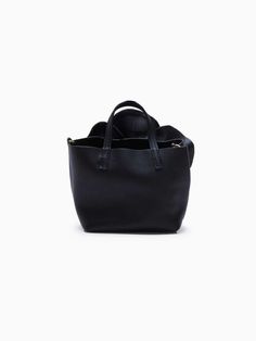 a black handbag on a white background