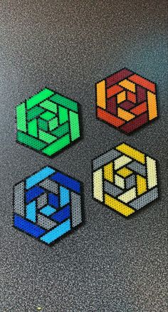 four different colored hexagons are shown on the surface