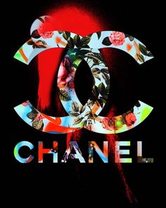 a chanel poster with flowers and leaves on it's black backgroung