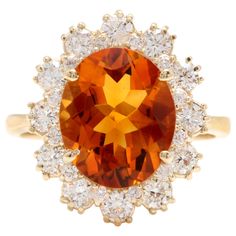 7.15 Carats Exquisite Natural Madeira Citrine and Diamond 14K Solid Yellow Gold Ring Total Natural Citrine Weights: 6.00 Carats Citrine Measures: 12 x 10mm Natural Round Diamonds Weight: 1.15 Carats (color G-H / Clarity Si1-SI2) Ring size: 7 (we offer free re-sizing upon request) Ring total weight: 6.2 grams Disclaimer: all weights, measurements and colors are approximate and may vary slightly from the listed dimensions or as seen in the image. All pictures are magnified to show the smallest of Yellow Citrine Ring, Stunning Aesthetic, Orange Jewelry, Citrine Jewelry, Sparkly Jewelry, Yellow Citrine, Citrine Ring, Natural Citrine, Citrine Gemstone