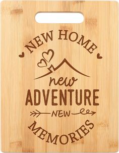 a cutting board with the words new home, new adventure and memories on it