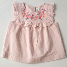 Brand New With Tags In New Condition. Pink Sleeveless Blouse With Bright Floral Embroidery And Ruffle Detail. 100% Cotton With 100% Cotton Lining. Girls Size 3t. Cute Embroidered Summer Tops, Cute Embroidered Tops For Spring, Cute Embroidered Spring Tops, Cute Floral Embroidery Summer Tops, Gap Cotton Tops For Summer, Cute Summer Blouse For Playtime, Cute Summer Playtime Blouse, Cute Blouse For Spring Playtime, Sleeveless Cotton Tops For Playtime