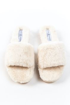 Slideeeee into coziness with the Rally Fluffy Slides! Add softness to every step with these incredible plush house slippers. With a hard textured sole, these slides are great for grabbing the mail on those cold mornings or afternoon walks around the block! *FINAL SALE* Soft Flat Slippers For Winter, Cozy Round Toe Slippers For Relaxation, Comfy Round Toe Slippers For Lounging, Comfortable Super Soft Indoor Slippers, Comfy Slippers For Lounging, Comfy Slippers For Loungewear, Super Soft Comfy Slippers With Round Toe, Comfy Winter Slippers With Textured Footbed, Comfy Super Soft Round Toe Slippers