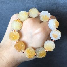 Natural SheTaicui Jade (Quartzite) carved icy Yellow Rose crystal charms Bracelet | Sweet & Elegant | personalized gift | S02 Rose bead diameter: 16.5mm, thickness: 14mm; Bracelet length: 16cm ( can extend to max. 18-19cm with bigger gold plated beads) 🌹An beautifully carved and polished rose bracelet with 11 stunning rose charms and 14k gold plated beads, which is romantic and elegant.  🌤️ It was made of real and natural SheTaicui jade (Quartzite), in icy yellow colour, which is elegant & swe White Carved Bracelet Jewelry, Carved White Bracelet Jewelry, White Carved Bracelet, Carved Round Beads Jewelry Gift, Carved Amber Round Beads Jewelry, Carved Jewelry Bracelet For Gift, Carved Bracelet Jewelry Gift, Carved Bracelet Jewelry As Gift, Rose Crystal