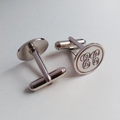 Groom Wedding Gift,Silver Men CuffLinks,Engraved Monogram CuffLinks,Gift for Fathers Day,Elegant Monogrammed CufflinksSmart and classy, silver monogram finish makes a wonderful personalized gift with his initialsPersonalize these cuffs with his initials (2-3 letters) and choose 925 sterling silver / 18k gold plated / white gold plated finish.* Please note the initials in the order you wish for them to appear. Traditionally a monogram is in this order: First, Last,Middle *Metal type: choice of 92 Luxury Modern Round Cufflinks, Monogram Cufflinks, Groom Wedding Gift, Wedding Cufflinks Groom, Monogram Necklace Gold, Monogrammed Cufflinks, Initial Cufflinks, Personalized Gold Necklace, Gift For Fathers Day