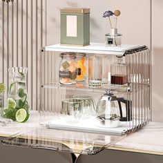 an image of a kitchen shelf with coffee pots and teapots on it's sides