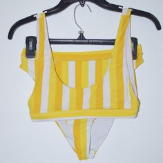 New Without Tags! Top Size Small, Bottom Size Medium. Ultra Bottom: Moderate/Cheeky Back Coverage, High-Cut Leg Design, And High Waist. Festival Top: Low Scooping Front, Classic Lines, Accentuates Back. Yellow Sleeveless Tankini For Beachwear, Yellow Stretch Sleeveless Tankini, Yellow Sleeveless Swimwear For Beach Season, Sleeveless Yellow Tankini For Beach Party, Yellow Triangle Top Tankini For Swimming, Trendy Yellow Sleeveless Swimwear, Yellow Triangle Top Tankini For Pool, Mustard Swimwear For Summer Poolside, Mustard Swimwear For Poolside In Summer