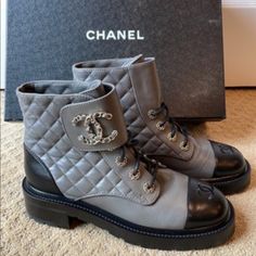 Chanel Interlocking Cc Logo Ankle Boots As Seen On Hbo Max’s “Just Like That” (Worn Once But Just A Tad Bit Loose On Me.) Sold Out Gorgeous Shiny Lambskin Black & Gray Quilted Leather Interlocking Chain Cc Logo Detail Like New (Small Crease Noted On Front Of Boot From Wearing It Once For About Two Hours.) Please Look At All Photos Closely. Shoes Will Come With Dust Bag And Original Shoe Box. Please Know Your Size In Chanel Boots. Firm On Price Shoes Chanel, Chanel Boots, Grey Quilt, Hbo Max, Cc Logo, Quilted Leather, Shoe Box, Black Gray, Bootie Boots