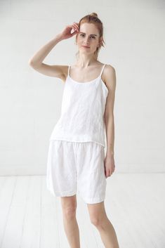 "DETAILS: * Natural 100% linen pajama set for women * Linen shorts and tank top for your comfortable sleep * Great gift for women, bride, girlfriend. * Made from soft wash medium weight (185 g) 100 % European linen fabric * Height of the model is 177 cm (5' 8\") and she is wearing size XS/S * Color - white. Please choose another color and size on the right * Product number: NIGHT02 CARE LABEL * machine wash gentle (40 C/104 F) * dry gentle on low heat * wrinkles give the character so there is no Relaxed Fit Pajama Shorts For Summer Bedtime, Summer Sleep Pajama Shorts Relaxed Fit, Relaxed Summer Sleepwear Shorts, Short Summer Camisole For Loungewear, Short Camisole For Summer Loungewear, Summer Linen Pajama Shorts For Loungewear, Relaxed Summer Sleepwear, White Linen Pajama Shorts For The Beach, White Linen Pajama Shorts For Beach