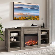 a living room with a fire place and a painting hanging on the wall above it