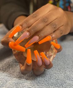 Orange Acrylic Nails Coffin Design, Orange Nails Coffin Long, Orange Full Set Nails, Neon Orange Nail Ideas Summer, Bright Summer Acrylic Nails Orange, Orange Acrylic Nails With Rhinestones, Orange Nails With Diamonds, Long Acrylic Nails Orange, Orange Coffin Nail Ideas