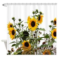 a shower curtain with sunflowers on it