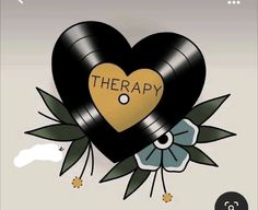 a heart with the word therapy written on it