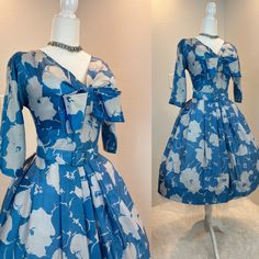 "Suzy Perrette dress / 1950s dress / 50s dress / 1950s fit and flare dress This 1950s Suzy Perette dress is made from a soft silk and has a gorgeous floral print. I love her floral print and how the fabric looks it's hard to tell if it is white flowers on blue or blue flowers on white. It is truly a magical print . She has the classic fit and flare cut with the nipped waist, a full skirt, and her original wide belt. She has a metal zipper in the back. Measurements provided are flat and have been Vintage Fitted A-line Tea Length Dress, 1950s Style A-line Dress With Box Pleat, 1950s Style Knee-length Party Dress, Vintage Full Skirt Wedding Dresses, 1950s Style Knee-length Midi Dress For Party, Retro A-line Cocktail Dress, Fitted Bodice Full Skirt Dress For Vintage Events, Retro Tea-length Dresses For Vintage Events, Vintage Tea-length Midi Dress With Fitted Bodice