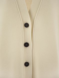 This cardigan characterised by essential lines combines a relaxed style with special details such as rib knitting. The wool, silk and cashmere composition makes the garment soft and warm. - Button fastening - V-neck - Ribbed knit DESIGNER ID: MAD214F034N128 25Composition: 75% Virgin wool, 15% Silk, 10% Cashmere Buttons Real horn Rib Knitting, Leather Cap, Cashmere Cardigan, Emilio Pucci, Yoga Wear, Denim Pant, Relaxed Style, Knitting Designs, Lanvin