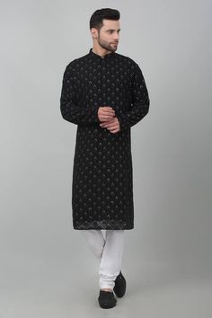 Black cotton kurta with all over floral checkered pattern, metallic sequin and tonal thread embroidery. Paired with contrast gathered churidar. - Aza Fashions Black Cotton Silk Kurta For Festive Occasions, Black Cotton Silk Kurta For Festivals, Designer Black Traditional Wear For Festive Season, Black Cotton Silk Kurta For Eid, Designer Black Traditional Wear For Diwali, Winter Cotton Kurta With Chikankari Embroidery, Designer Black Kurta With Resham Embroidery, Designer Long Sleeve Kurta With Mirror Work, Black Straight Kurta For Winter