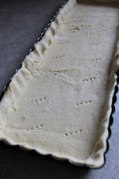 an uncooked pastry sitting on top of a counter