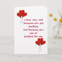 a valentine's day card with three red hearts in the shape of heart balloons