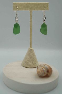 Green Sea Glass Pieces: Teardrop Shaped Earring Pair (E#33) Teardrop Sea Glass Earrings With Ear Wire, Elegant Green Sea Glass Jewelry, Green Sea Glass Earrings With Ear Wire, Elegant Sea Glass Dangle Earrings, Sea Glass Teardrop Earrings As Gift, Teardrop Sea Glass Earrings For Gift, Artisan Jewelry Necklaces, Sea Glass Earrings, Handcrafted Artisan Jewelry