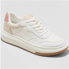 Complete Your Everyday Look In Style With The Flora Lace-Up Sneaker From Universal Thread. Featuring A Lace-Up Closure To Help You Find The Perfect Fit, These Mid-Width Sneakers Feature A Breathable Upper That Will Keep Your Feet Cool And Comfortable. Featuring Sporty Embroidered Detailing On The Sides, These Closed-Toe Sneakers Look Great With Everything From Shorts To Skinny Jeans To Dresses, Adding Fashion- Forward Style To Your Casual Looks. Material: 58% Leather And 42% Tpr. Pink Chunky Sneakers With Branded Insole, Pink Chunky Sneakers For Jogging With Round Toe, Pink Sporty Platform Sneakers With Vulcanized Sole, Pink Chunky Sneakers With Round Toe, Pink High-top Chunky Sneakers With Vulcanized Sole, Sporty Pink Platform Sneakers With Vulcanized Sole, Pink Low-top Platform Sneakers, Pink Chunky Sneakers With Vulcanized Sole, Pink Synthetic Chunky Sneakers For Sports